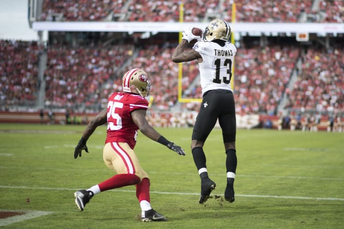 New Orleans Saints wide receiver Michael Thomas (13) catches a touchdown against San Francisco 49ers cornerback Jimmie Ward (25). Mandatory Credit: Kyle Terada-USA TODAY Sports